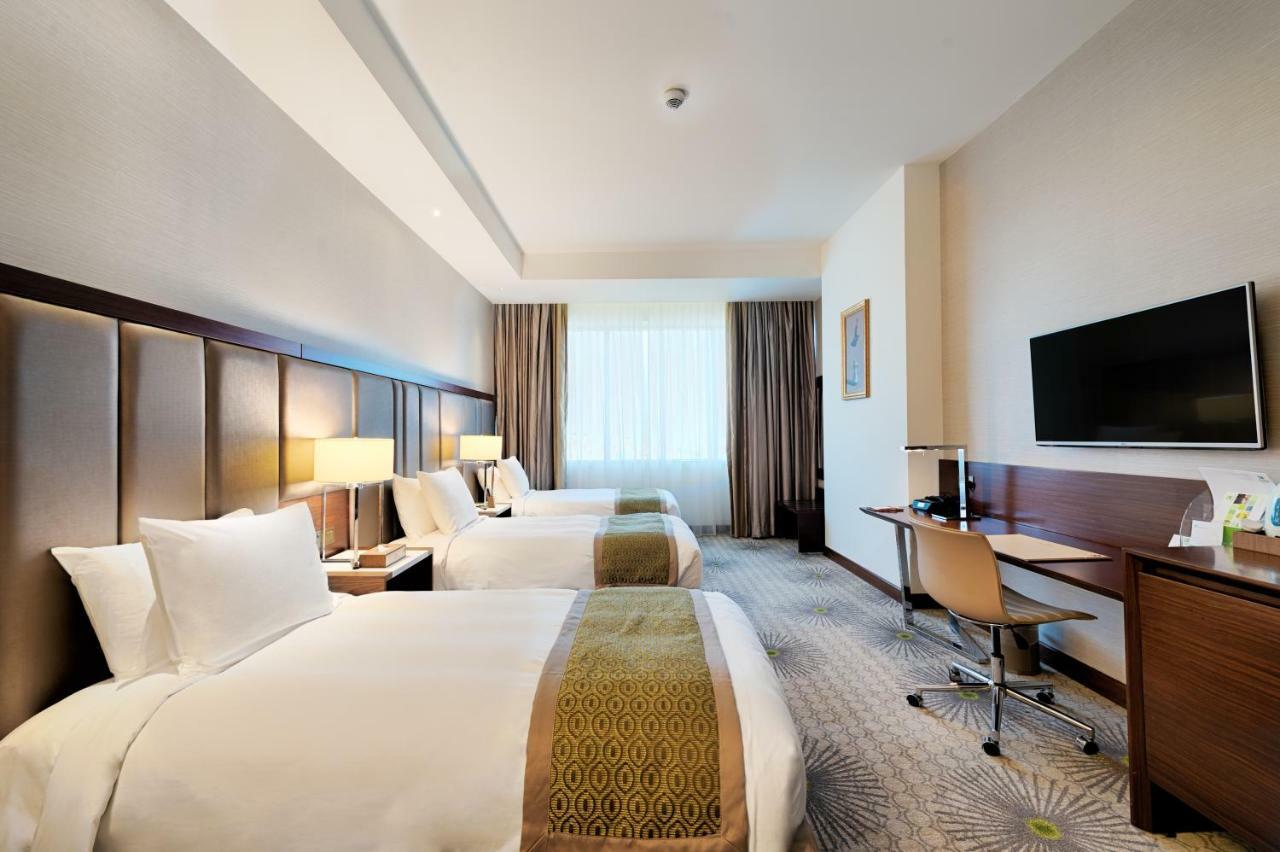 Holiday Suites Al Azizia 메카 외부 사진 A room at the hotel